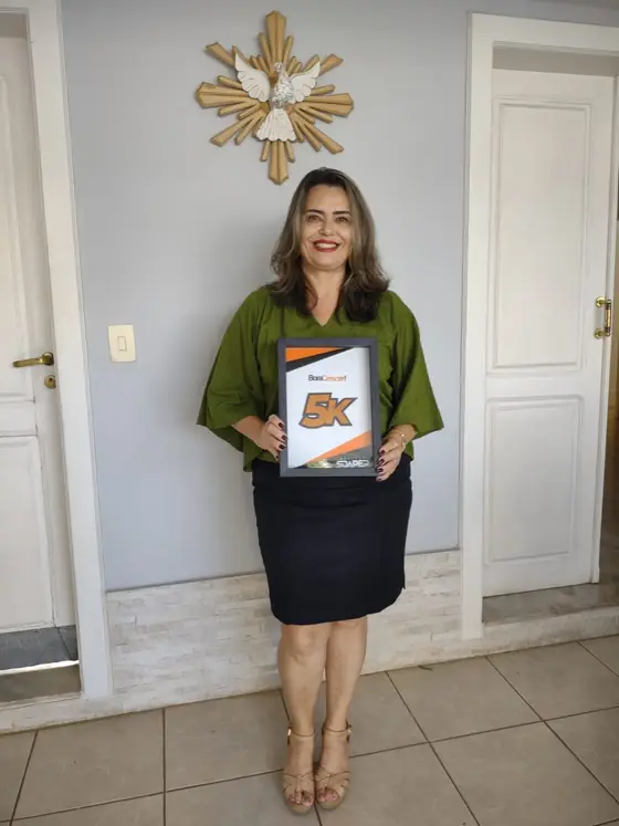 Patrícia Metzker Pifano De Melo com a placa 5K